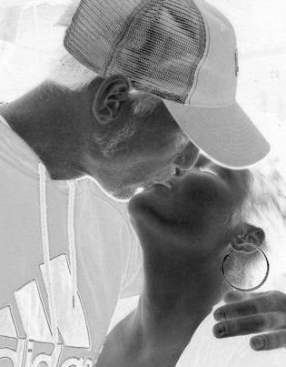 DJ Natural Nate® and Jiggabot, intimate black and white moment, Adidas hat